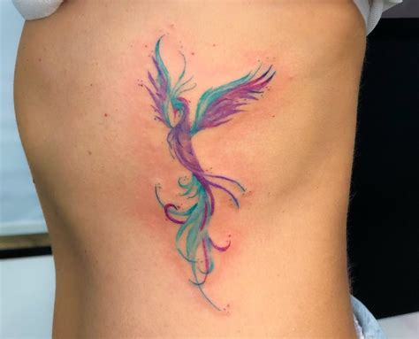 ave fenix resurgiendo de las cenizas tatuaje|Tatuaje Ave Fenix, Aquí te contamos su significado y。